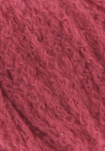 Cashmere Light fra Langyarns. Inneholder 88% Kashmir og 12% Polyamid. Strikkefasthet 20 masker x 31 omganger = 10 x 10 cm. Anbefalt pinne 5,5 og 6 mm. Her i fargen 61. Bildet viser garnets struktur.