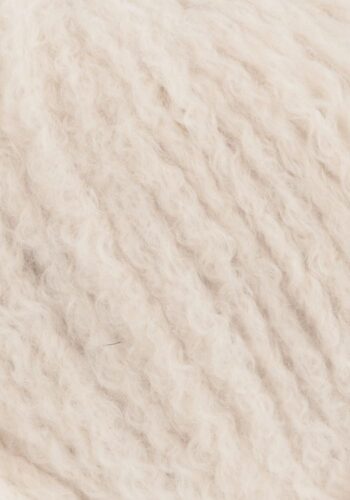 Cashmere Light fra Langyarns. Inneholder 88% Kashmir og 12% Polyamid. Strikkefasthet 20 masker x 31 omganger = 10 x 10 cm. Anbefalt pinne 5,5 og 6 mm. Her i fargen 96. Utsnittsbilde
