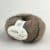 Nellie By Permin, kidmohair og silke. Inneholder 55% superfine alpaca, 24% bomuld, 21% merinould. 18-20 masker x 28-30 pinner = 10 cm. Her i fargen 414 Kamel/brun.