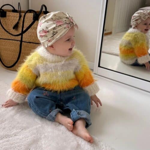 Myk og komfortabel Baby Fuzzy Mista Sweater til små barn.